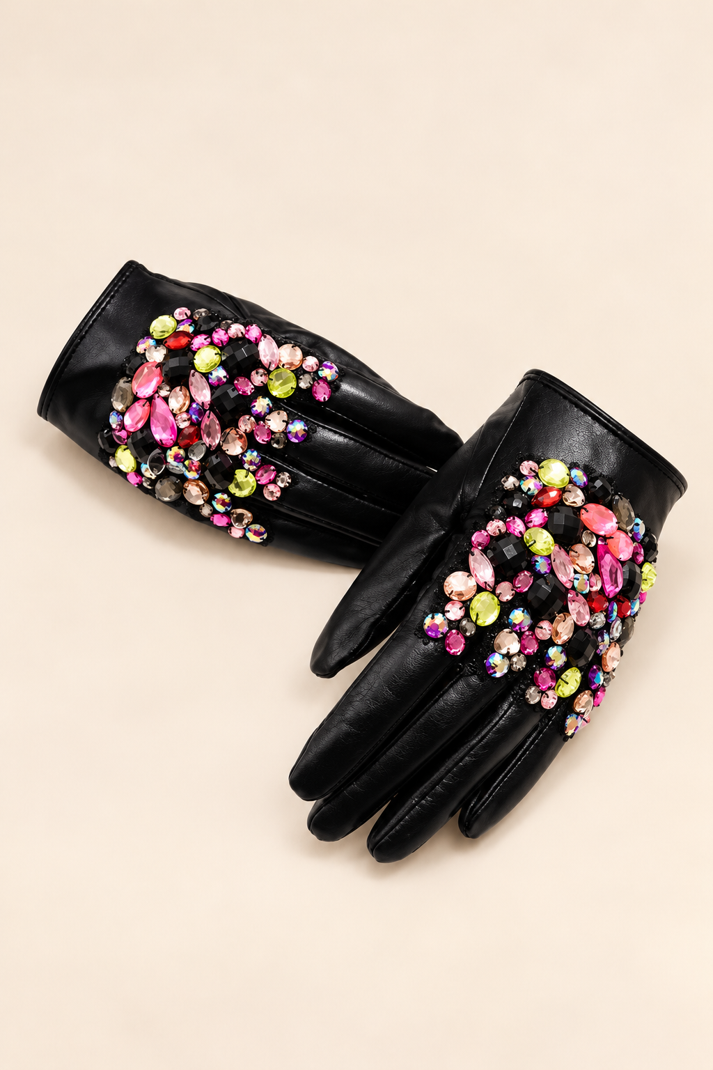 The Diva Gloves, black gloves with multicolor crystal clusters, on an ivory backdrop