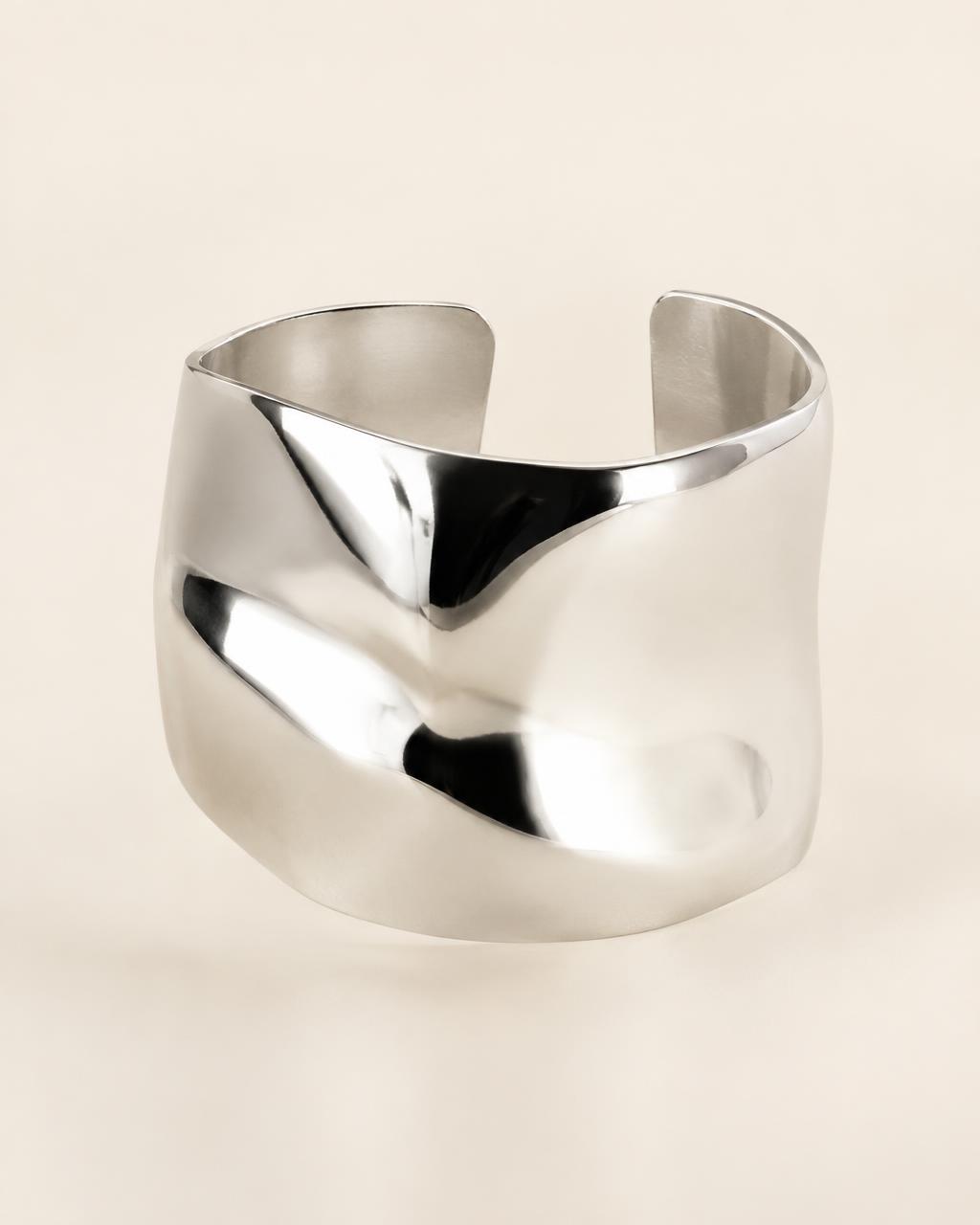 The Statement Cuff, a wide sculptural silver bracelet