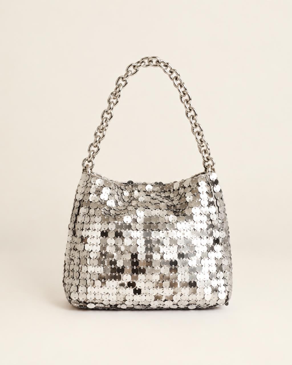 The Statement Mini covered in silver paillettes with chain handle